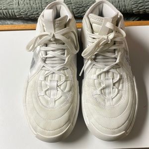 Womens white Adidas basketball shoe. Size 9.